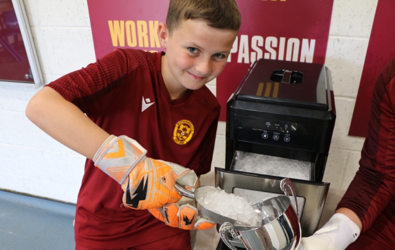 Well Society donate ice machine to academy