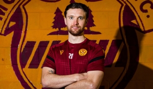 Elliot Watt ahead of Aberdeen